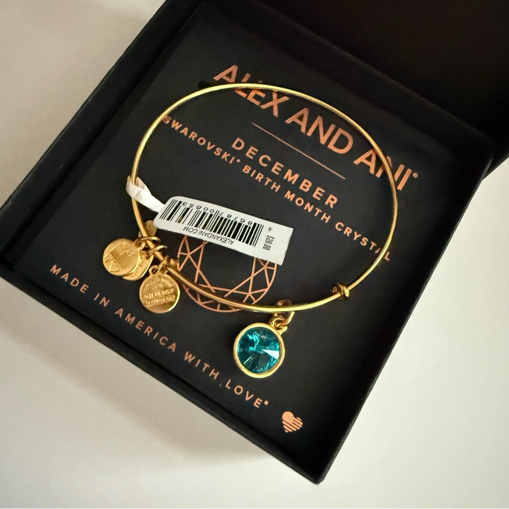 🔸SOLD🔸Alex and Ani Gold Bangle with Blue Crystal Charm